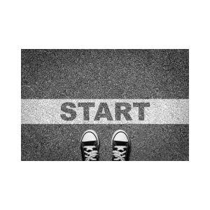 image of two feet in sneakers just behind a line labeled "start"