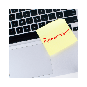 laptop keyboard with yellow post-it attached with red text reading "remember"!